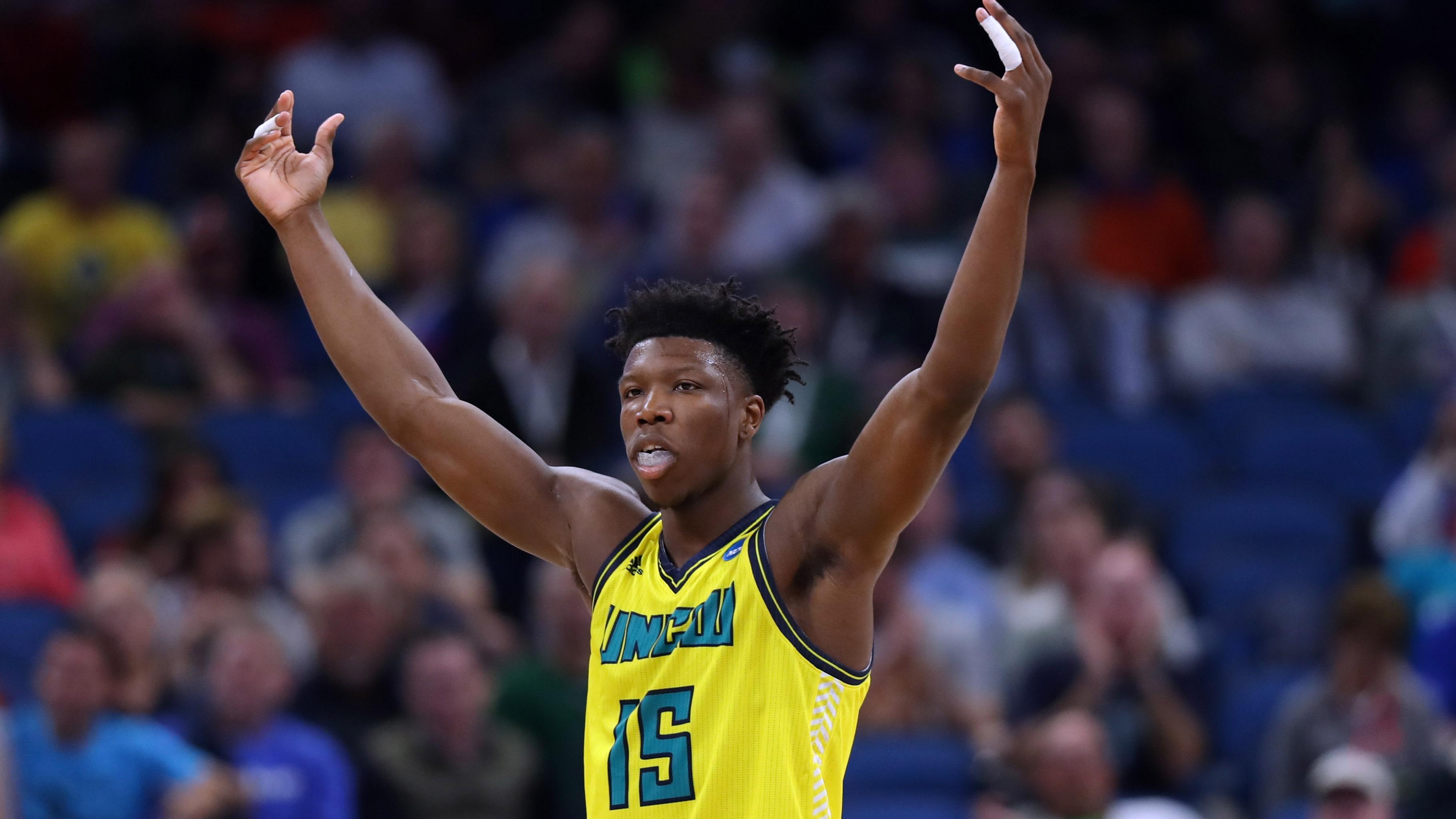 UNC Wilmington's Devontae Cacok pumps up the crowd