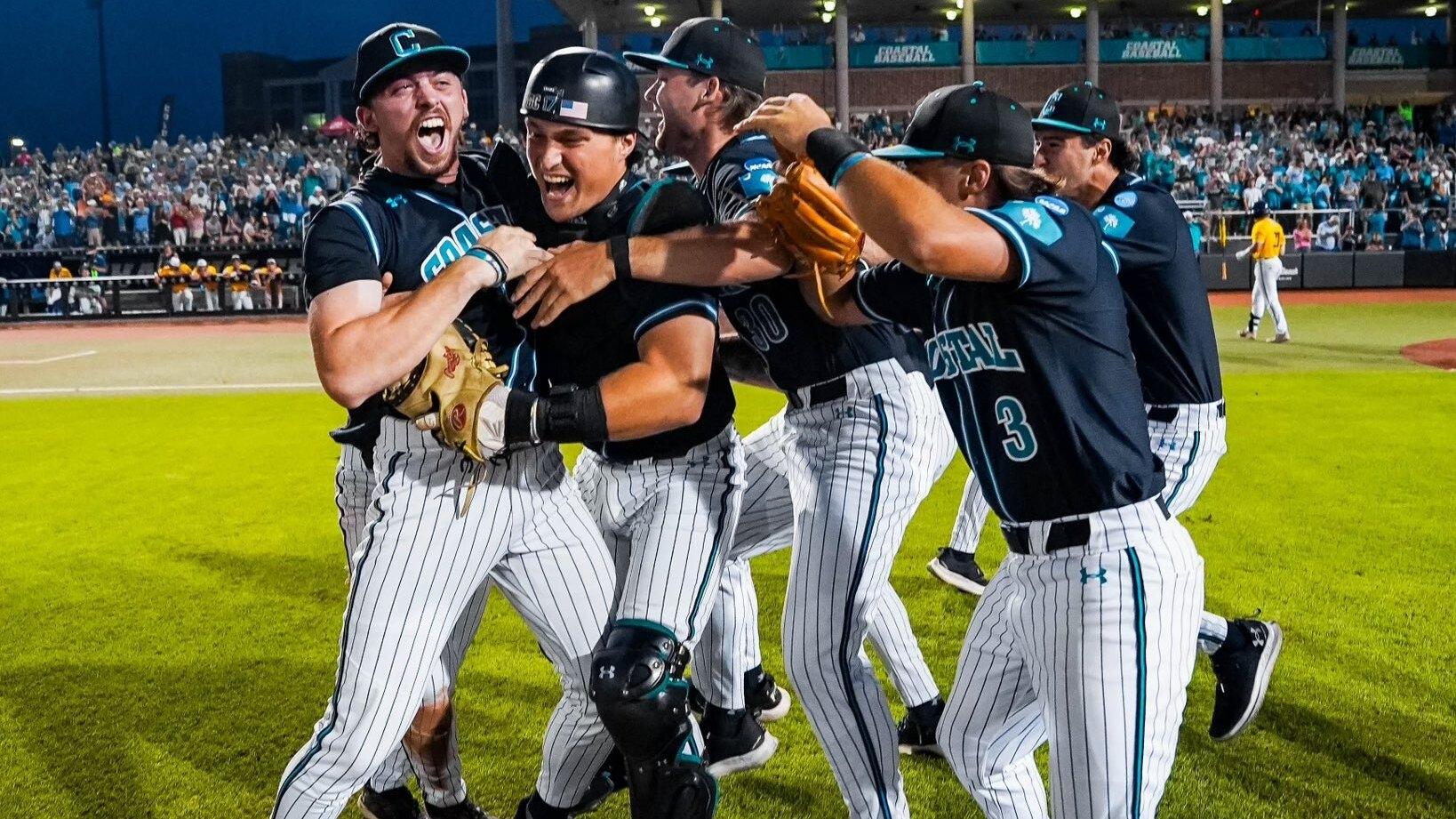 Coastal Carolina baseball players celebrate a regional win over East Carolina